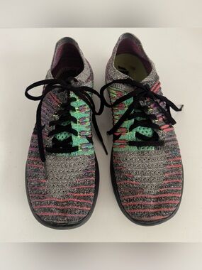 Nike Women’s Gray Knit Running Shoes with Pink and Green Accents